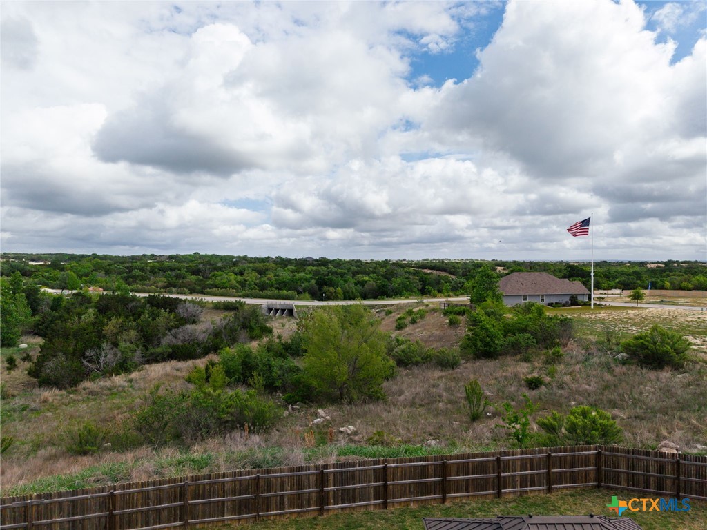 2044 Mallard Court Copperas Cove, TX 76522 - Photo 40 of 41 a view of a green field with wooden fence