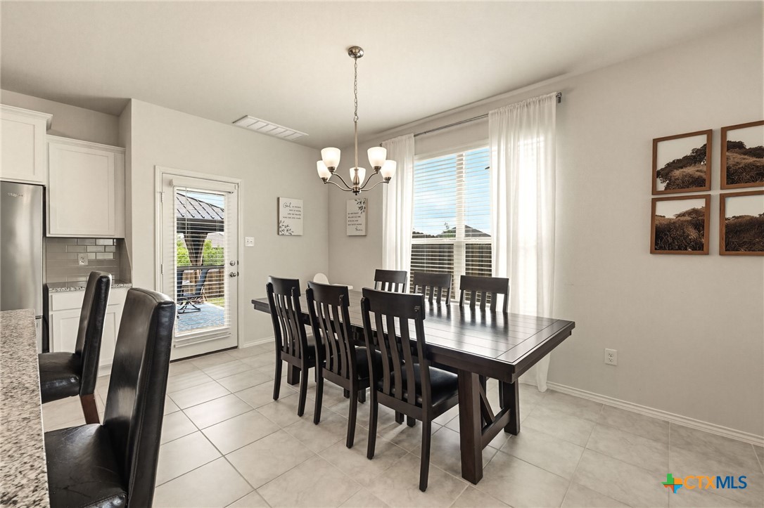 2044 Mallard Court Copperas Cove, TX 76522 - Photo 8 of 41 a view of a dining room with furniture window and outside view