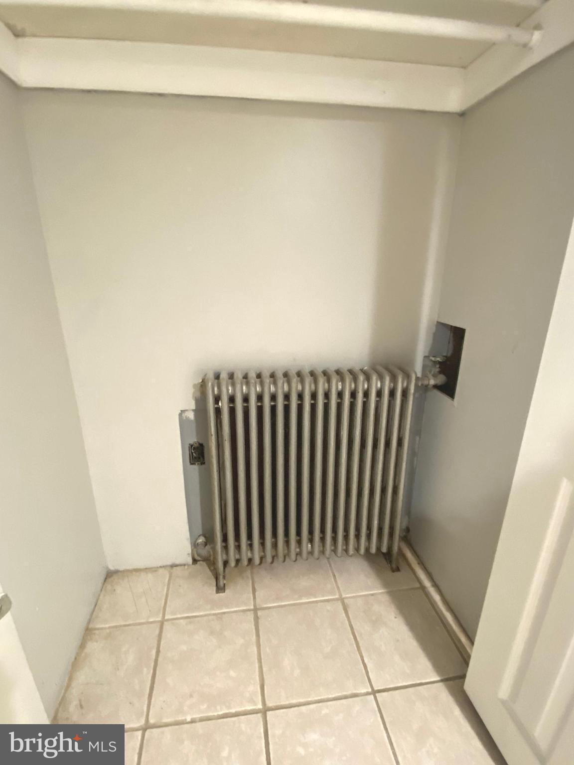 2981 Cornwall Road Dundalk, MD 21222 - Photo 51 of 78 Basement Bathroom Large Closet w radiator