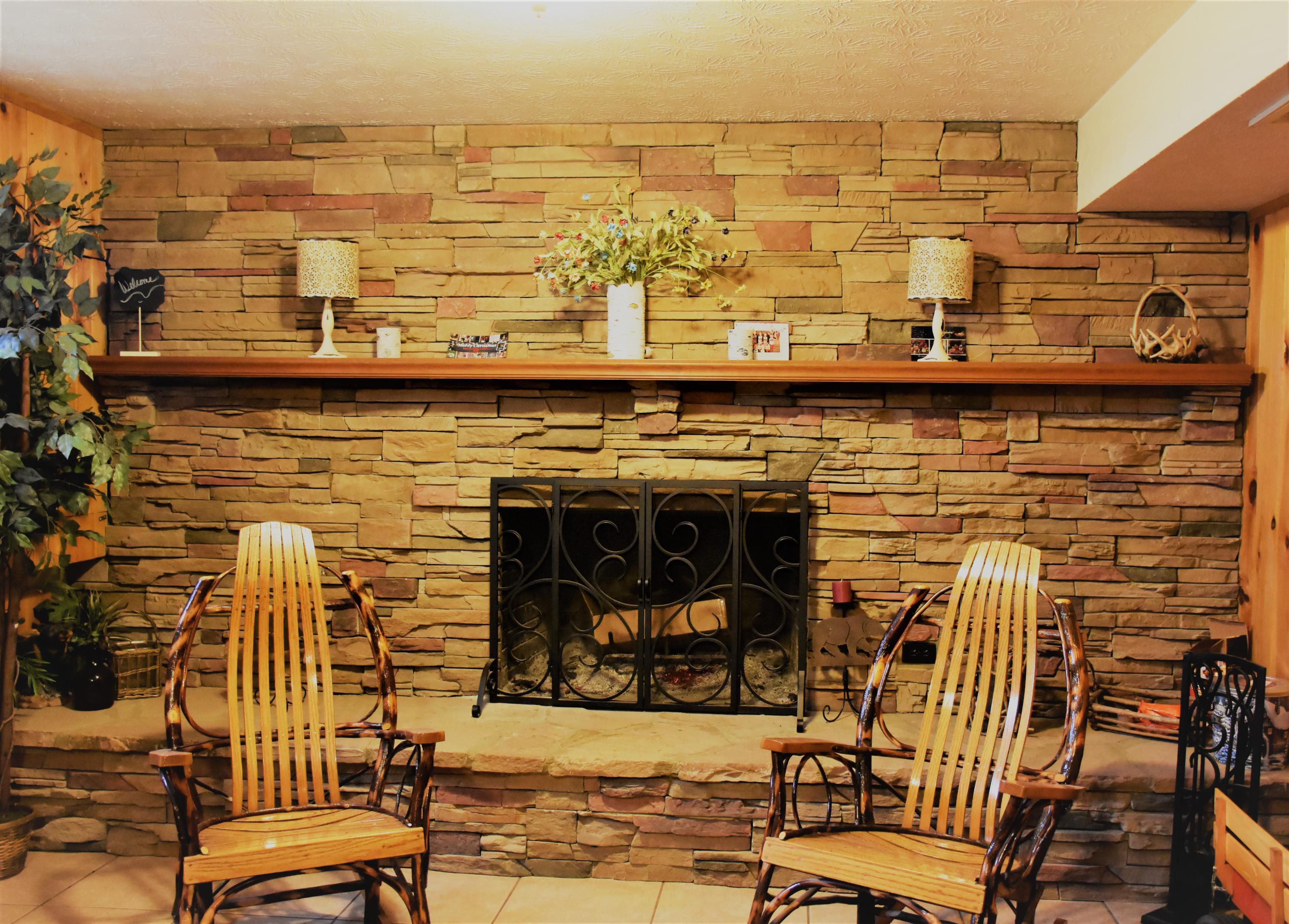 429 Disco Loop Road Friendsville, TN 37737 - Photo 22 of 36 Basement Fireplace
