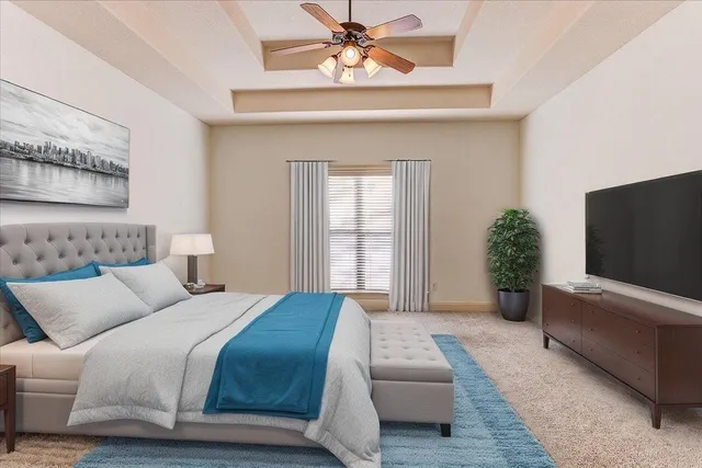 a bathroom with a granite countertop toilet sink and mirror