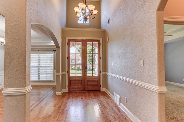 a view of entryway with wooden floor