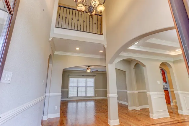 a view of livingroom with hardwood floor and hallway