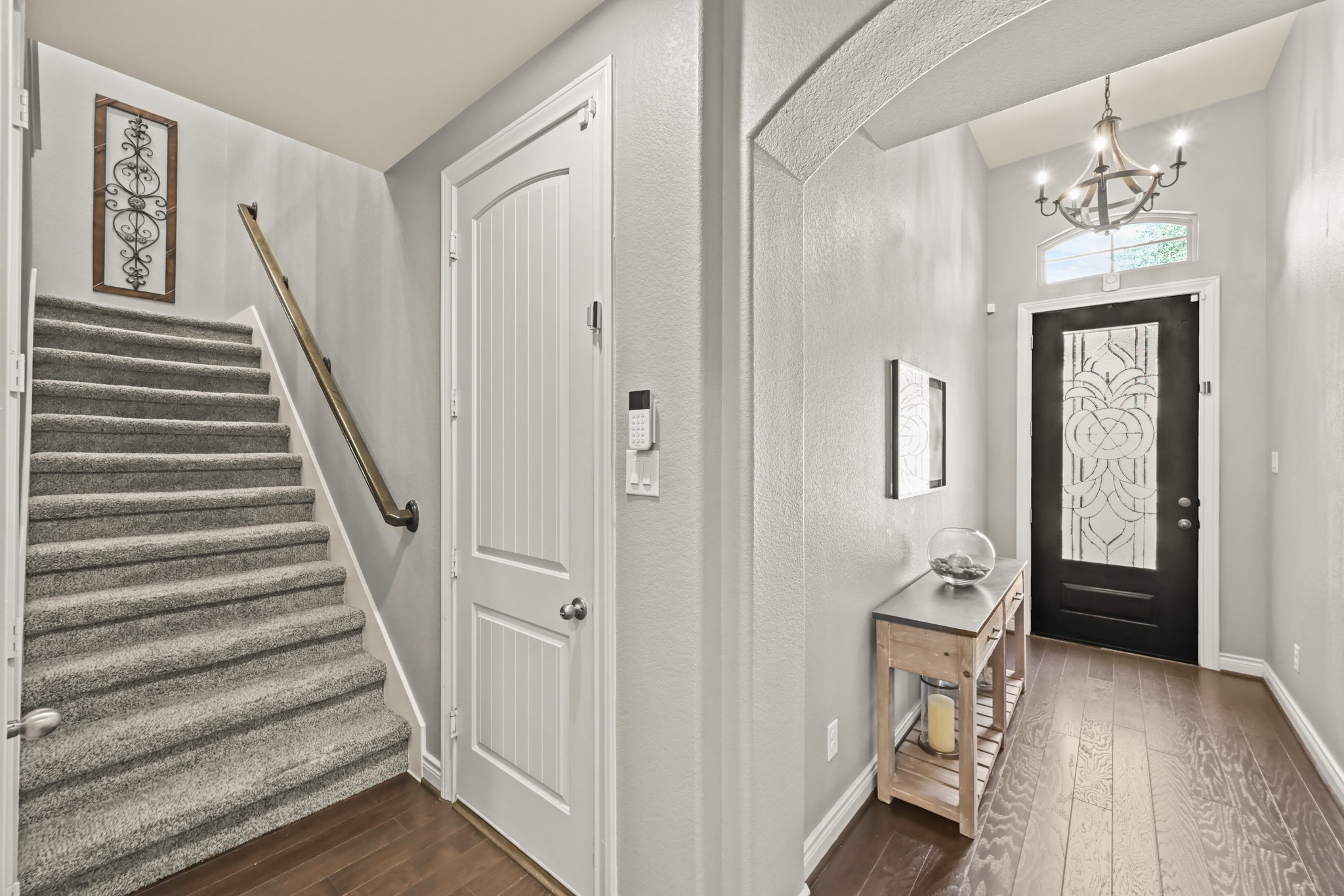 24214 Calico Trace Lane Katy, TX 77494 - Photo 15 of 49 a view of a hallway with wooden floor and staircase