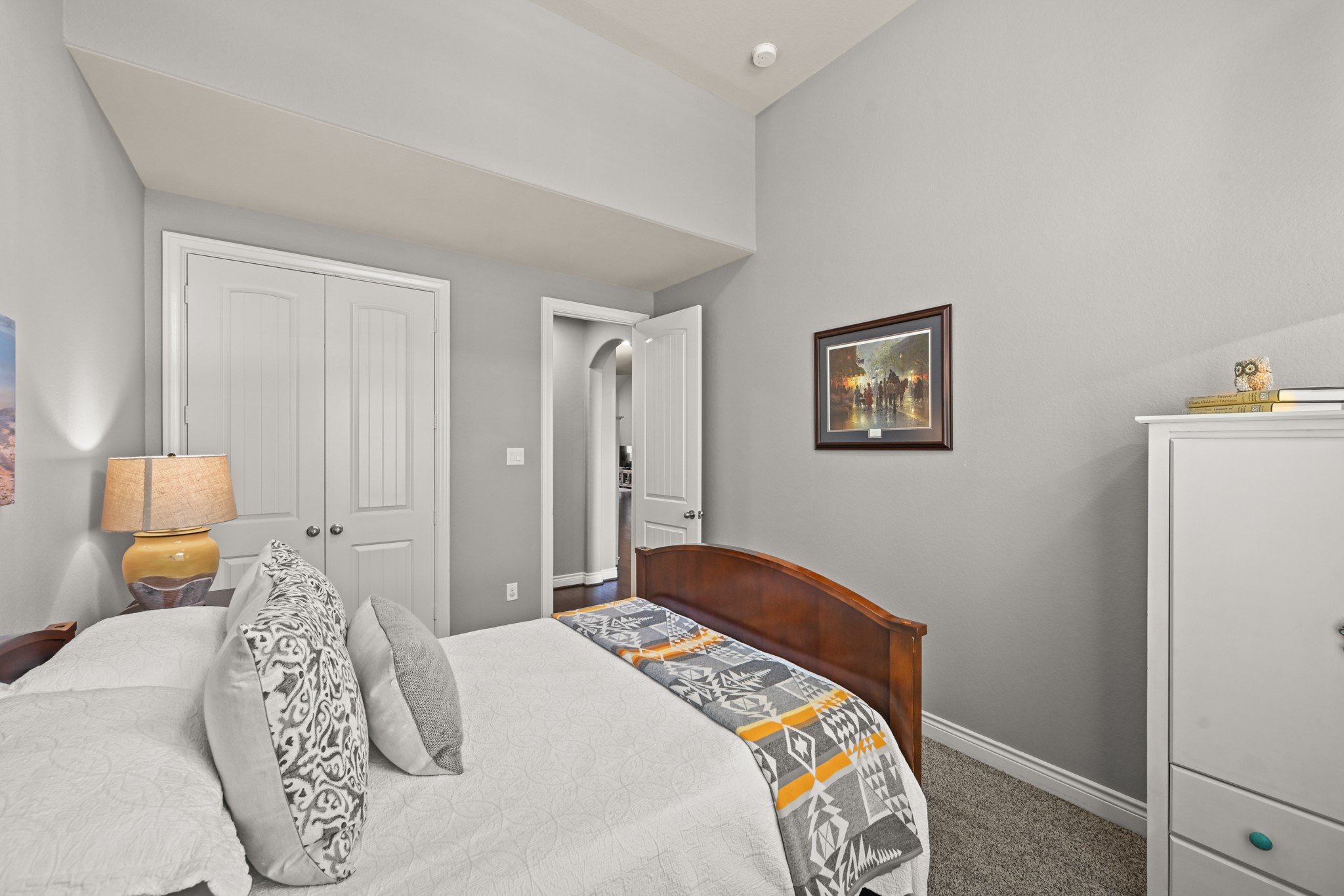 24214 Calico Trace Lane Katy, TX 77494 - Photo 30 of 49 a bedroom with a bed and a lamp