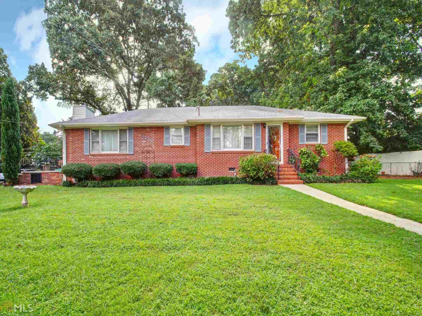 5910 Meadowview Road Rex, GA 30273 - Photo 1 of 1 a front view of house with yard and green space