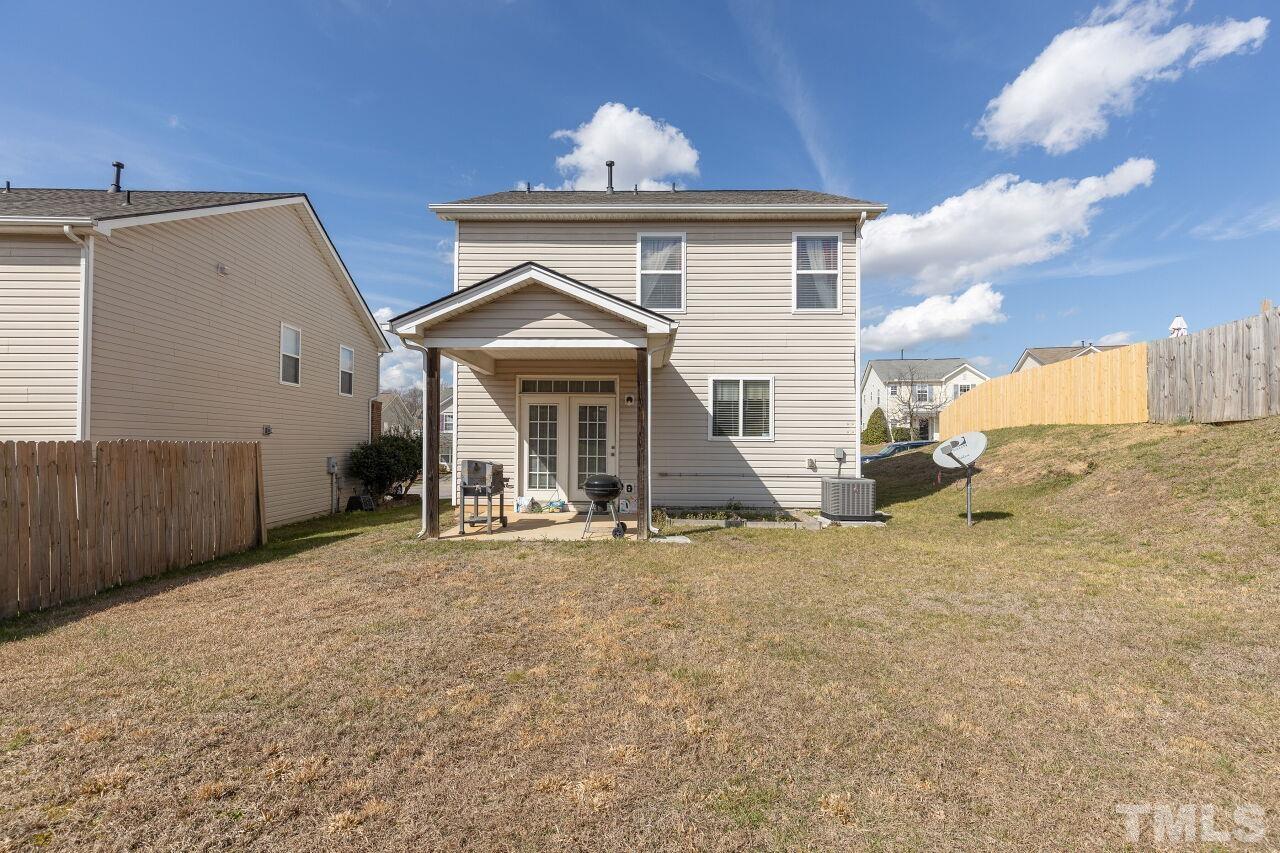 6012 Ladish Lane Raleigh, NC 27610 - Photo 29 of 29 a view of a house with a yard