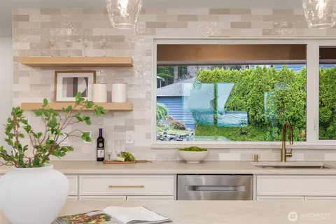 a kitchen with a sink and a window
