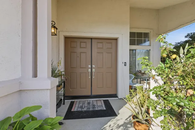 a bathroom with a toilet and shower