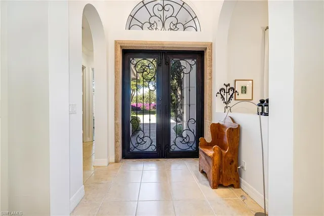 a view of entryway with a hallway and a closet
