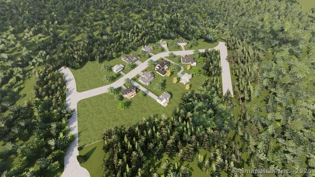 an aerial view of a house with outdoor space and street view