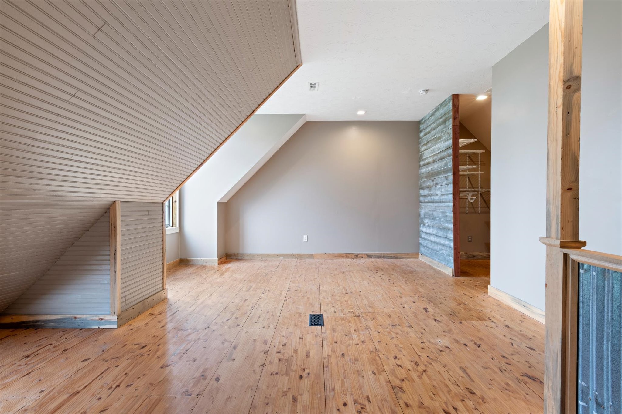 471 Northup Road Portland, TN 37148 - Photo 18 of 38 an empty room with wooden floor and windows