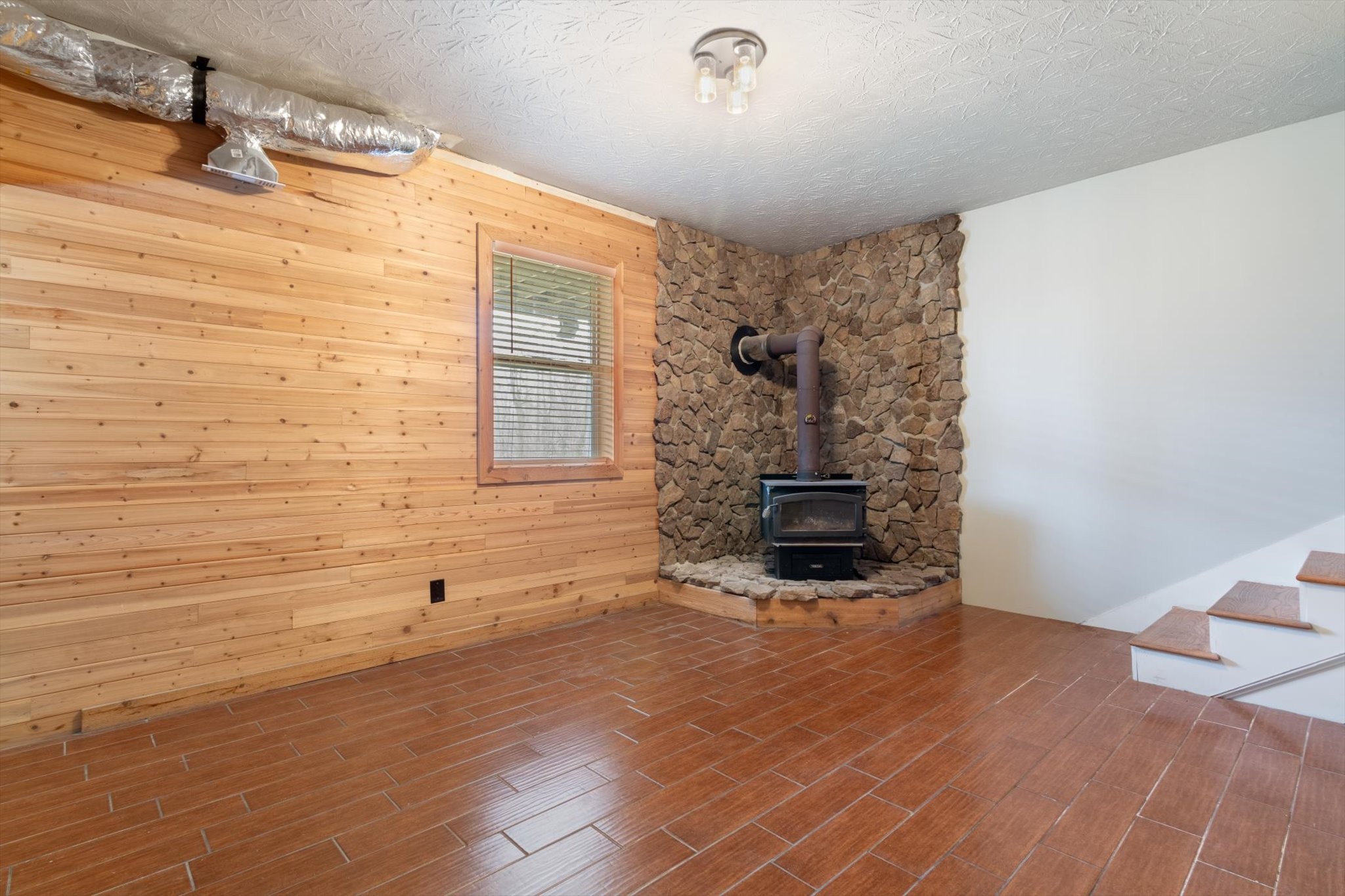 471 Northup Road Portland, TN 37148 - Photo 20 of 38 a view of empty room with wooden floor