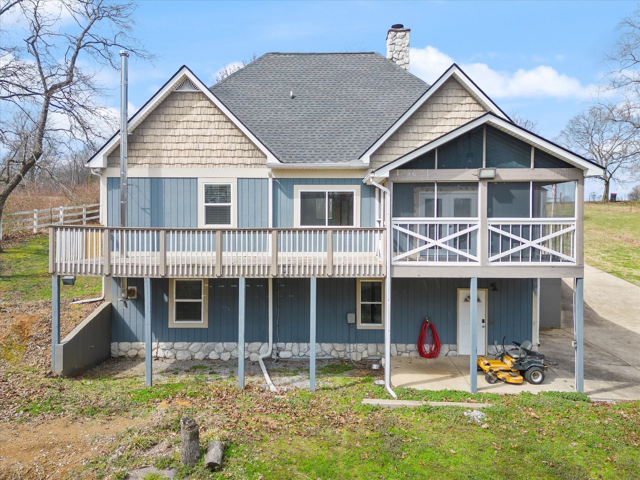 471 Northup Road Portland, TN 37148 - Photo 26 of 38 a front view of a house with a yard and seating space