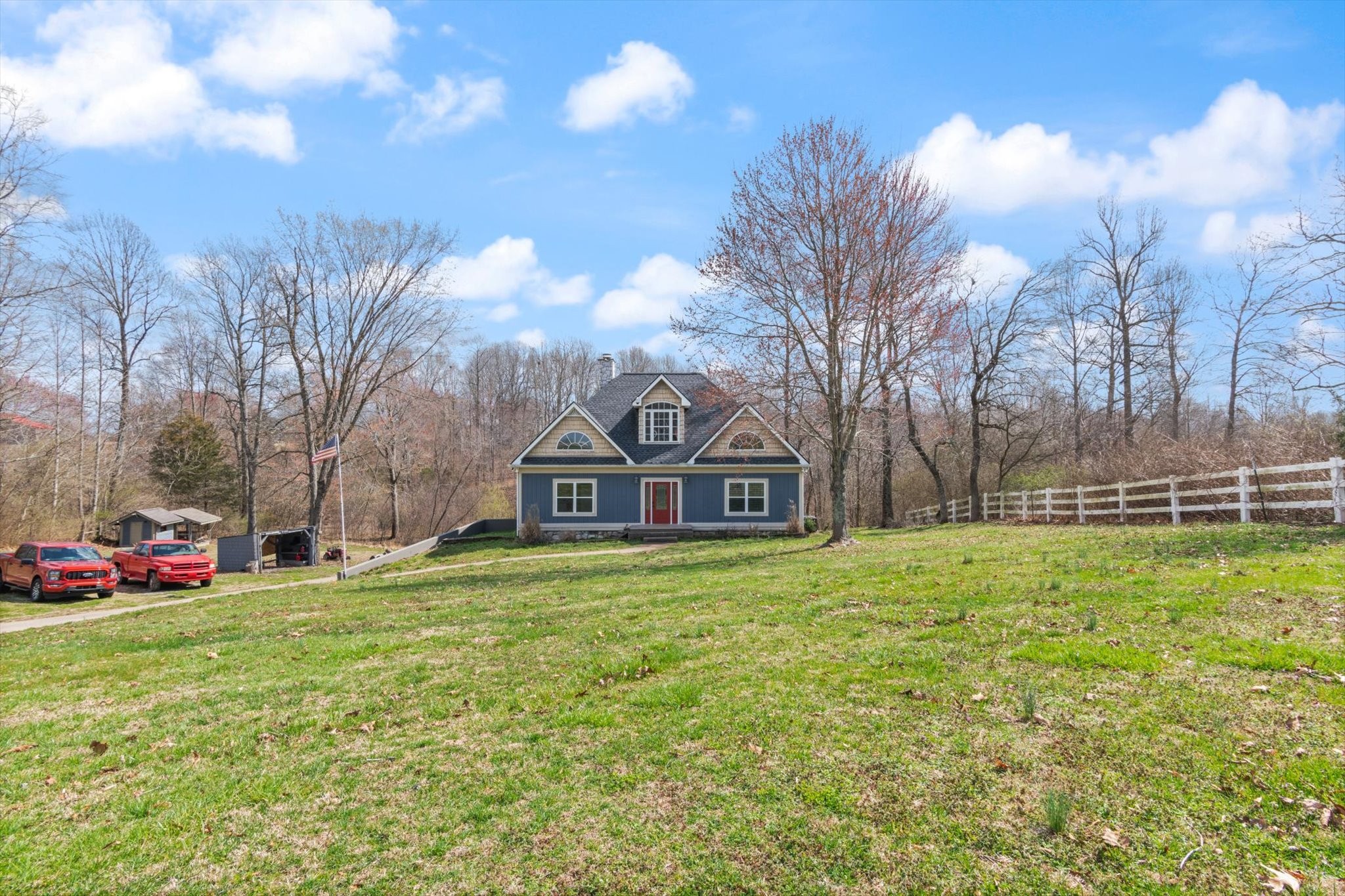 471 Northup Road Portland, TN 37148 - Photo 34 of 38 a front view of a house with a yard and garage