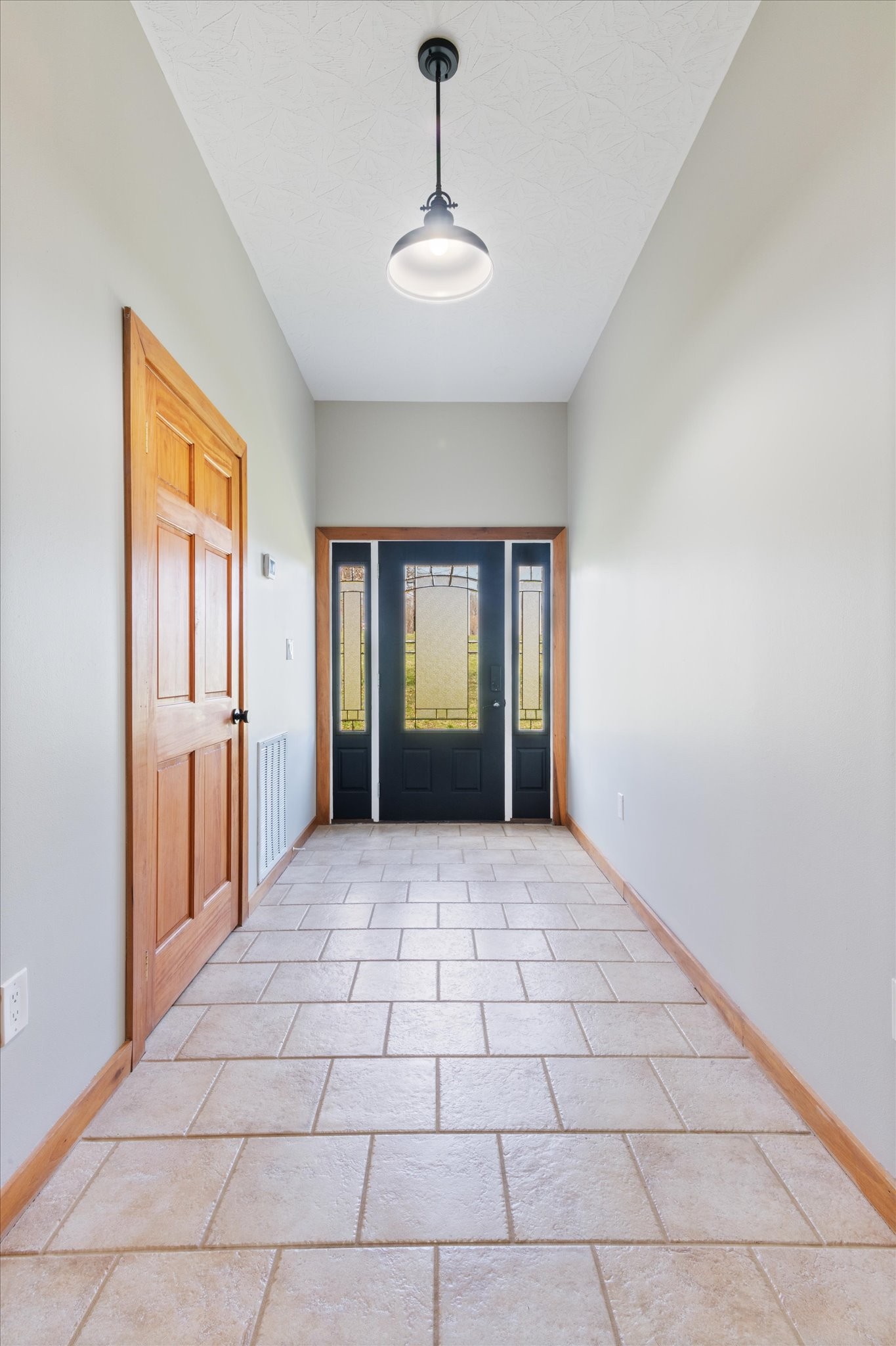 471 Northup Road Portland, TN 37148 - Photo 5 of 38 a view of an empty room with window and cabinet