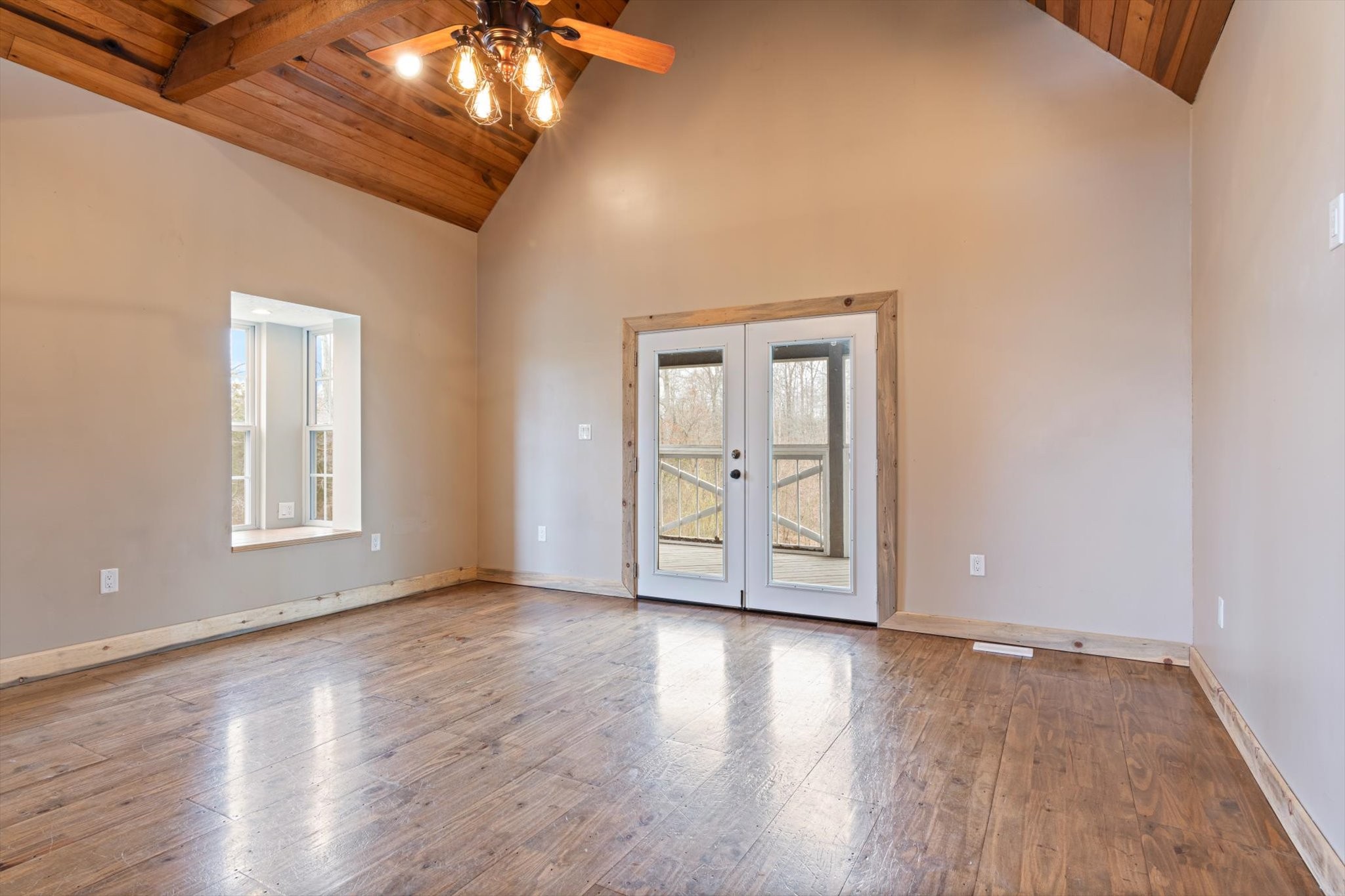 471 Northup Road Portland, TN 37148 - Photo 7 of 38 a view of an empty room with wooden floor and a window