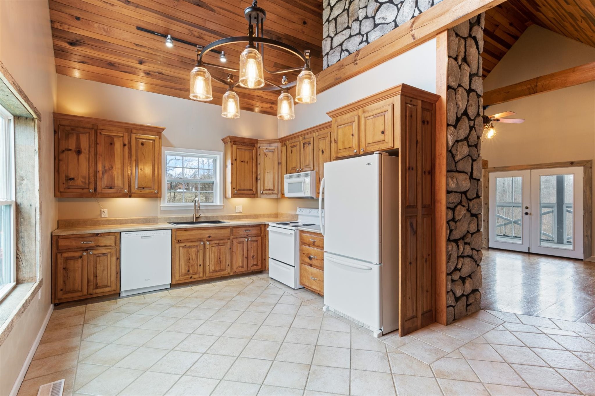 471 Northup Road Portland, TN 37148 - Photo 8 of 38 a large kitchen with cabinets and stainless steel appliances