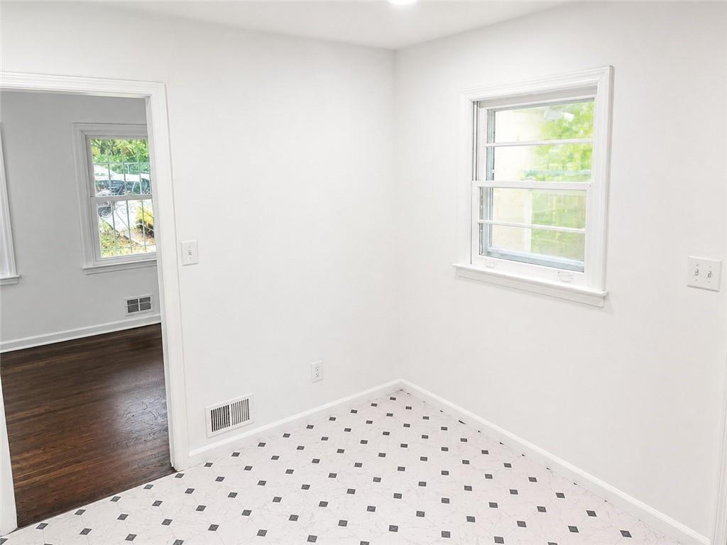 1189 Rock Cut Road Forest Park, GA 30297 - Photo 18 of 23 a view of a bedroom with a window
