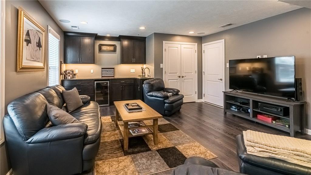 307 Rosecliff Road Wexford, PA 15090 - Photo 2 of 25 Stunning Game Room W/Custom Wet Bar, Refrigerator and Engineered Hardwood Floors