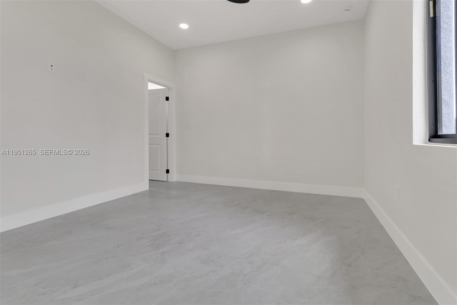 4501 15th Street Southwest, Unit 4501 Lehigh Acres, FL 33973 - Photo 11 of 40 a view of an empty room