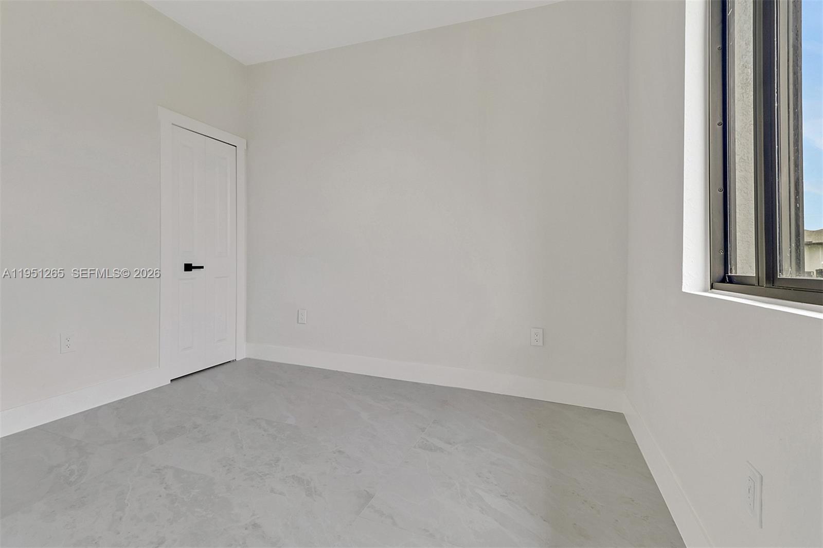 4501 15th Street Southwest, Unit 4501 Lehigh Acres, FL 33973 - Photo 15 of 40 a view of an empty room