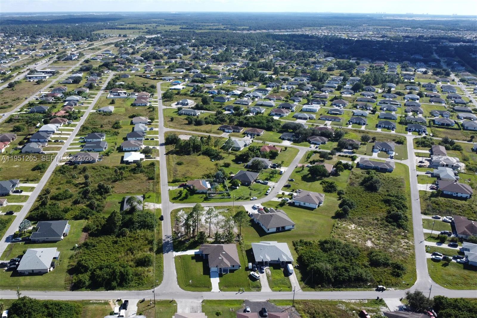 4501 15th Street Southwest, Unit 4501 Lehigh Acres, FL 33973 - Photo 29 of 40 an aerial view of multiple house
