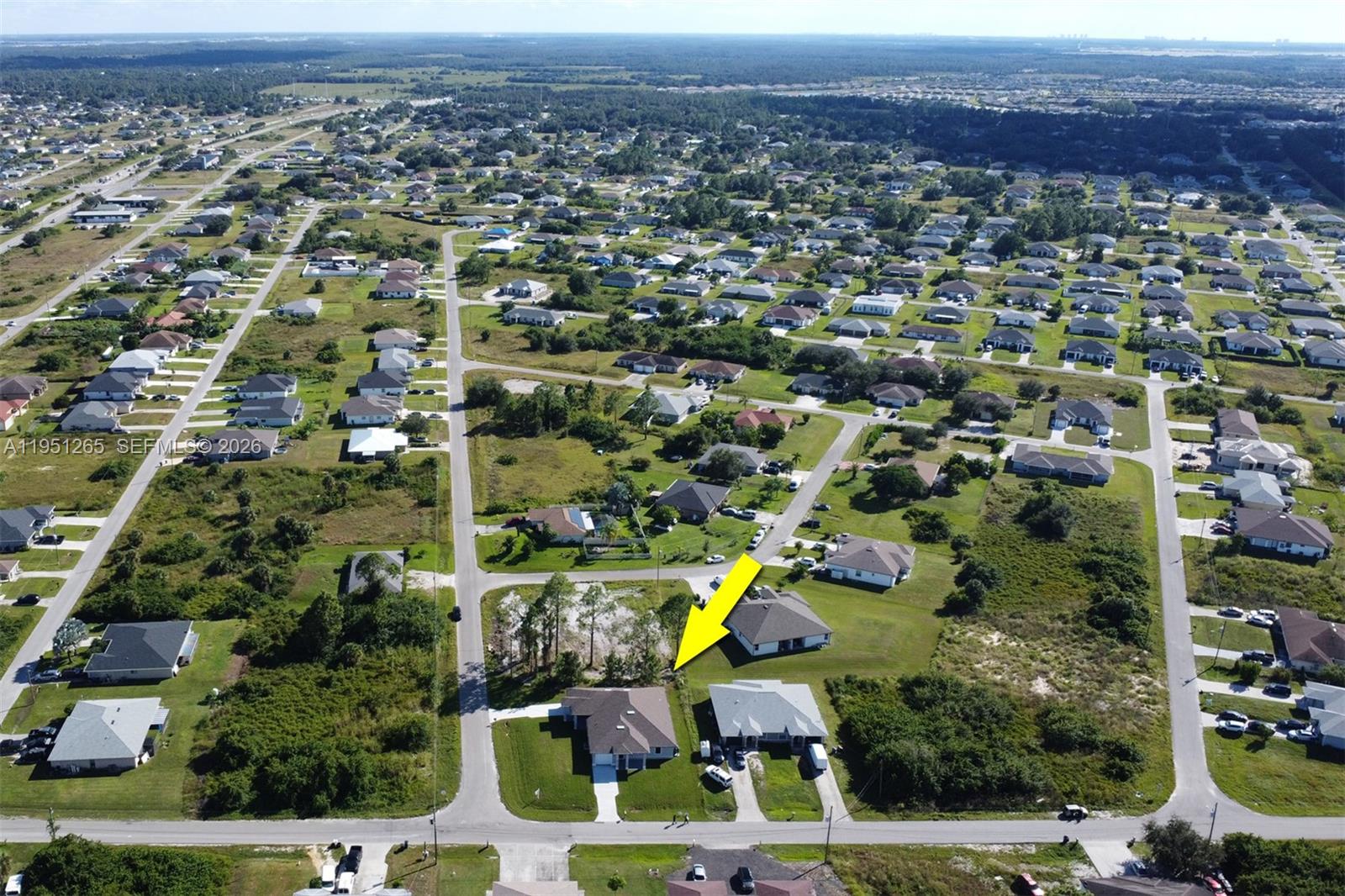 4501 15th Street Southwest, Unit 4501 Lehigh Acres, FL 33973 - Photo 31 of 40 an aerial view of multiple house