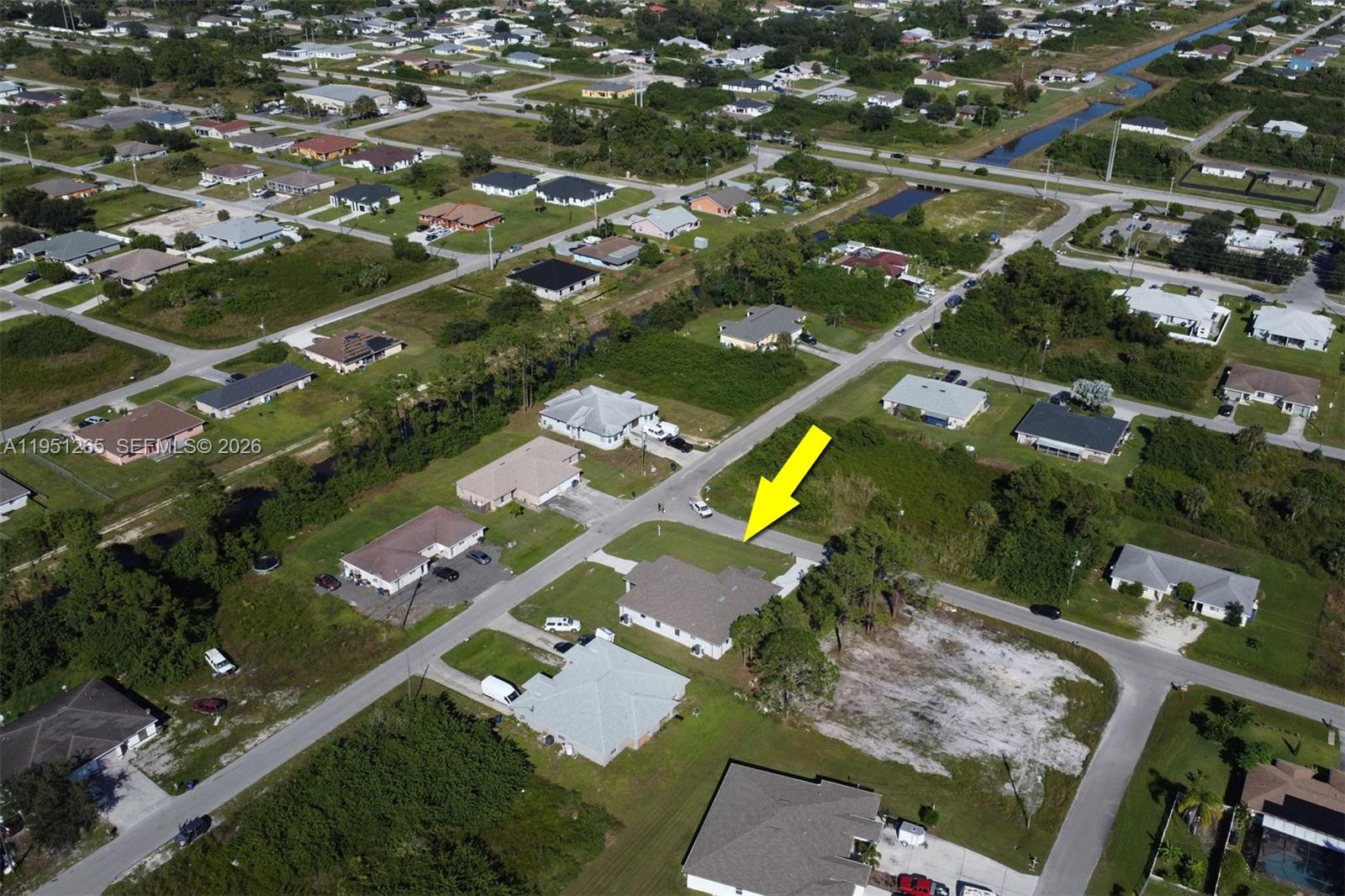 4501 15th Street Southwest, Unit 4501 Lehigh Acres, FL 33973 - Photo 34 of 40 an aerial view of a city