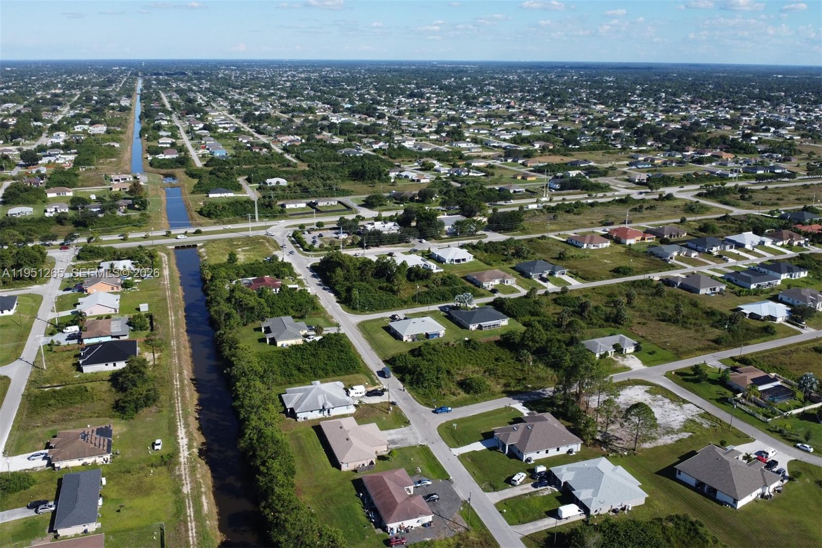 4501 15th Street Southwest, Unit 4501 Lehigh Acres, FL 33973 - Photo 39 of 40 an aerial view of multiple house
