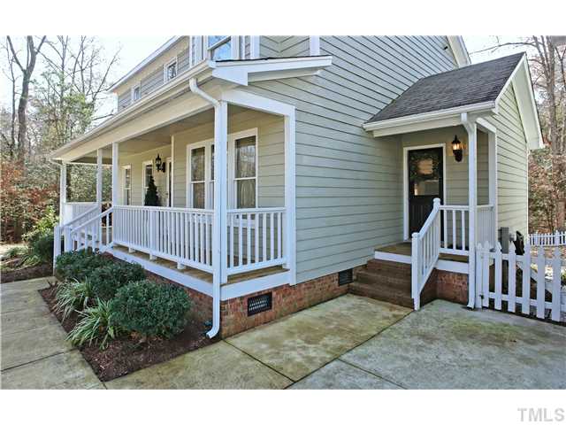 3106 Gold Digger Road Clayton, NC 27520 - Photo 21 of 22 Great side entry leads to Utility Room and then into Kitchen!