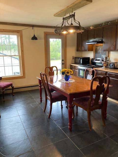 541 Highway 150 Parkman, ME 04443 - Photo 12 of 31 Kitchen toward side yard
