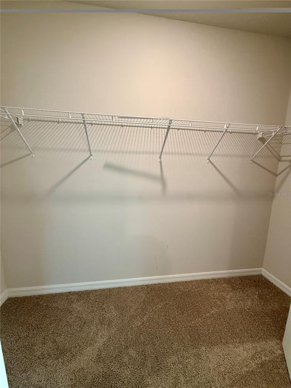 3222 Bitterroot Lane Bradenton, FL 34211 - Photo 20 of 34 a view of a room with racks on the wall