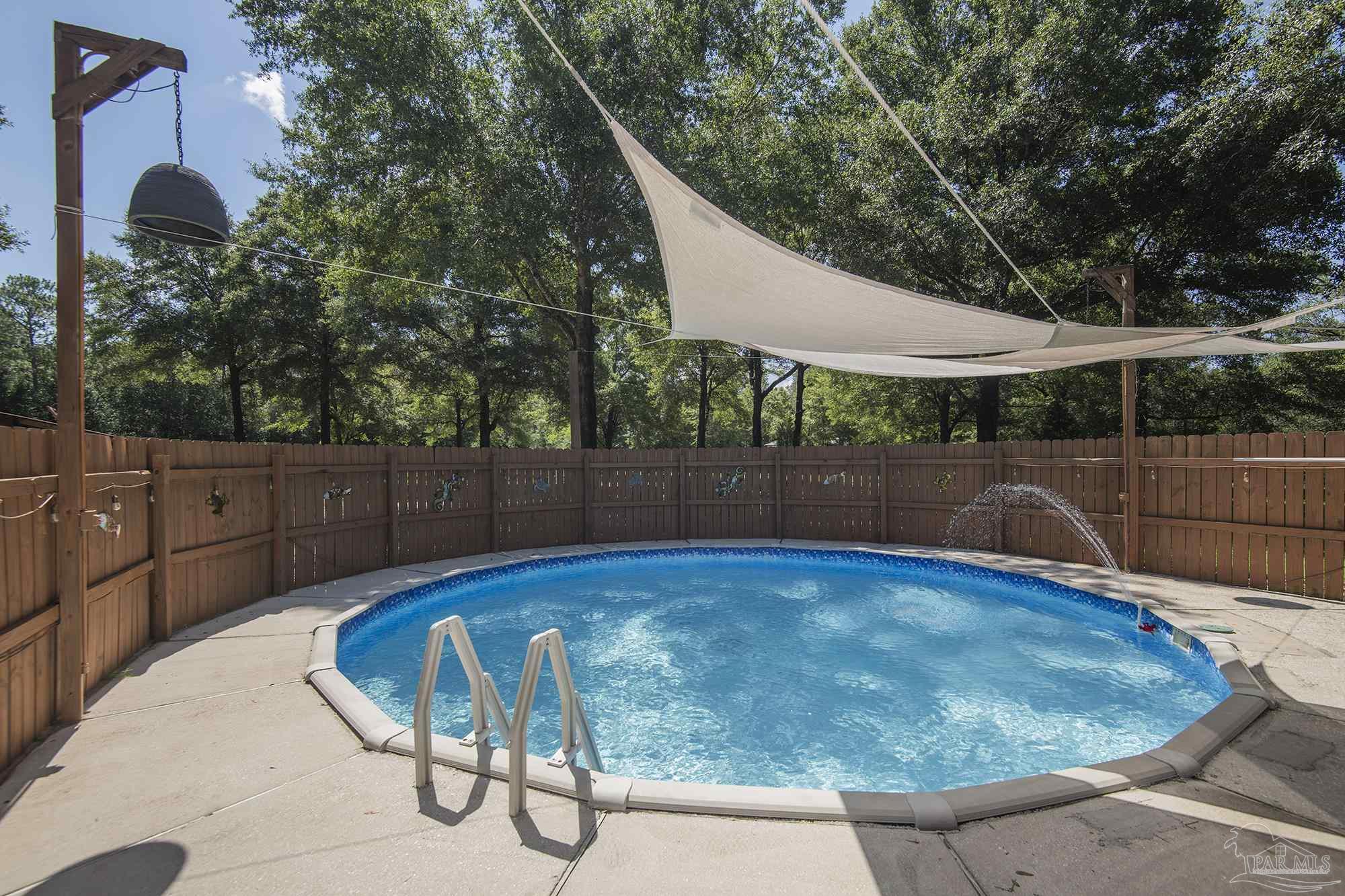 6739 Deception Road Milton, FL 32583 - Photo 12 of 24 a view of a backyard