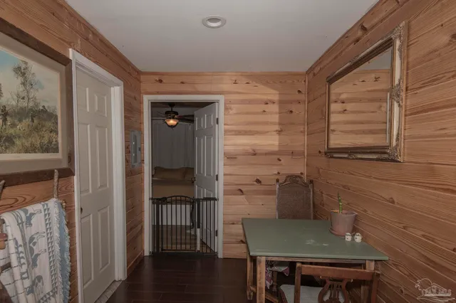 a view of a door and chair in the room