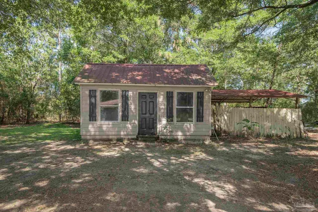 a house view with a garden space