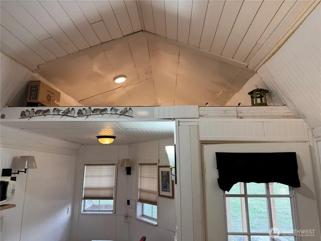 a view of swimming pool with a backyard