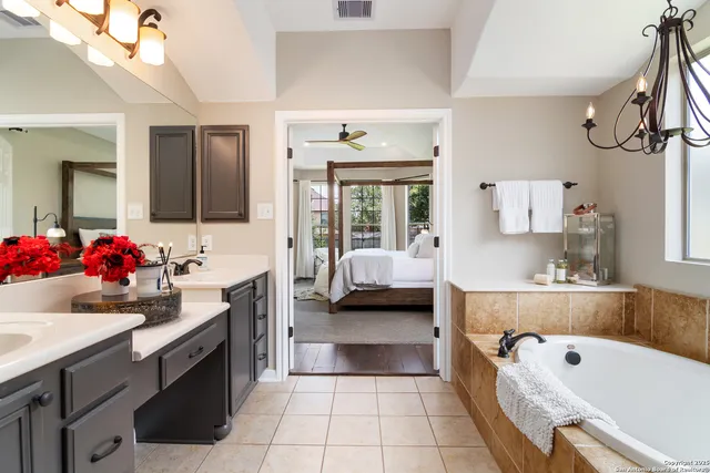 a kitchen with a sink and a stove top oven