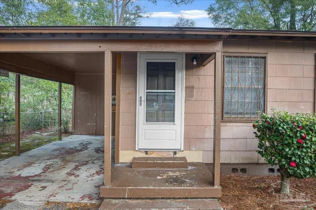 a view of backyard with green space