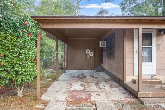 an aerial view of residential houses with city view