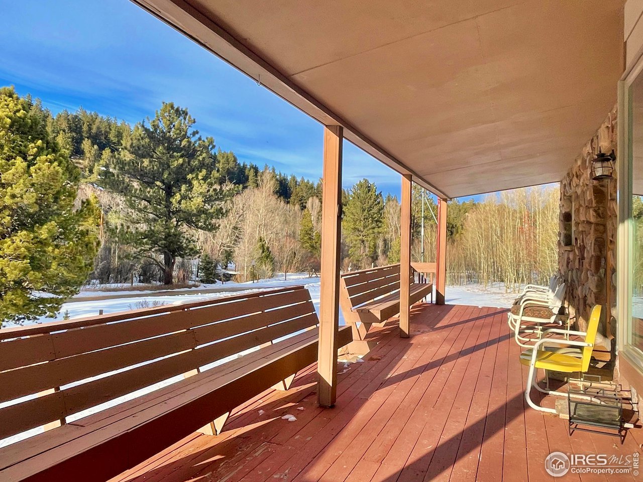 44 Riverside Lane Ward, CO 80481 - Photo 19 of 33 a view of a balcony with chairs