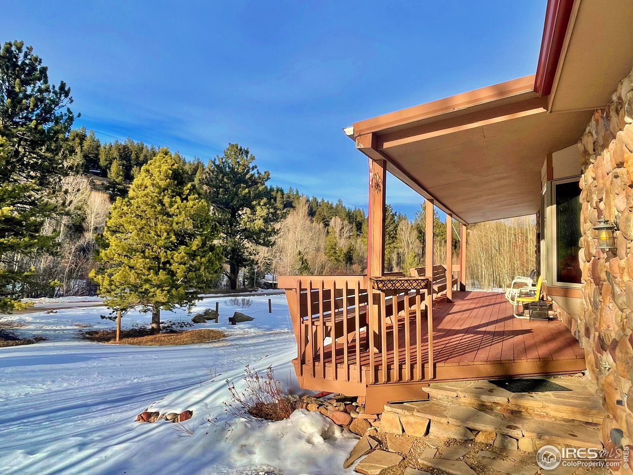 44 Riverside Lane Ward, CO 80481 - Photo 2 of 33 a view of outdoor space with seating area