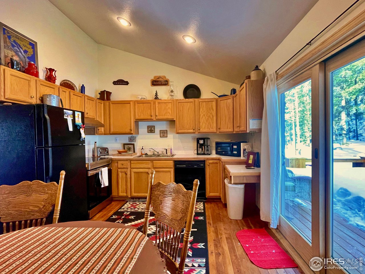 44 Riverside Lane Ward, CO 80481 - Photo 10 of 33 a very nice looking room with many windows