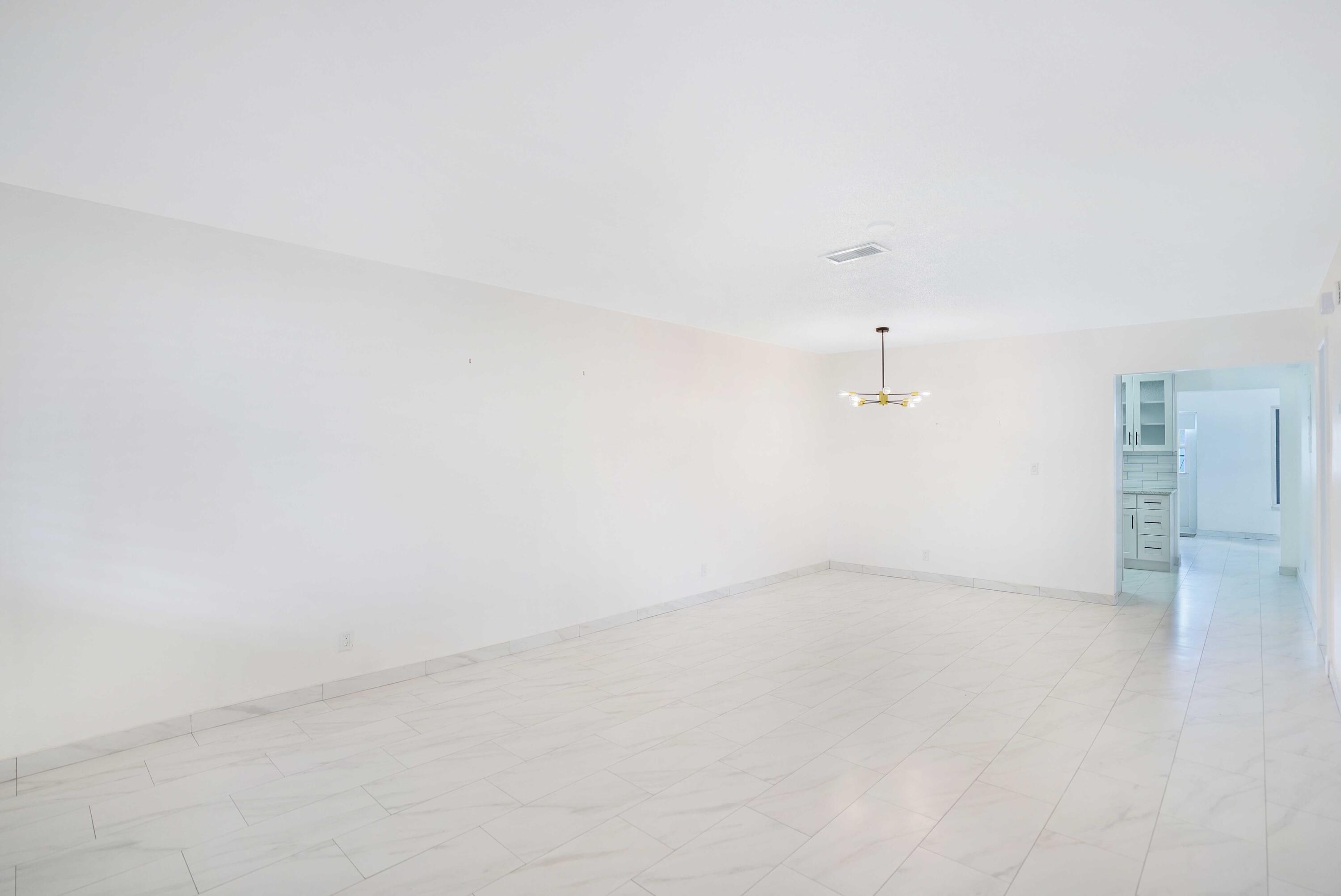 5100 Northeast 22nd Avenue Lighthouse Point, FL 33064 - Photo 27 of 31 a view of an empty room
