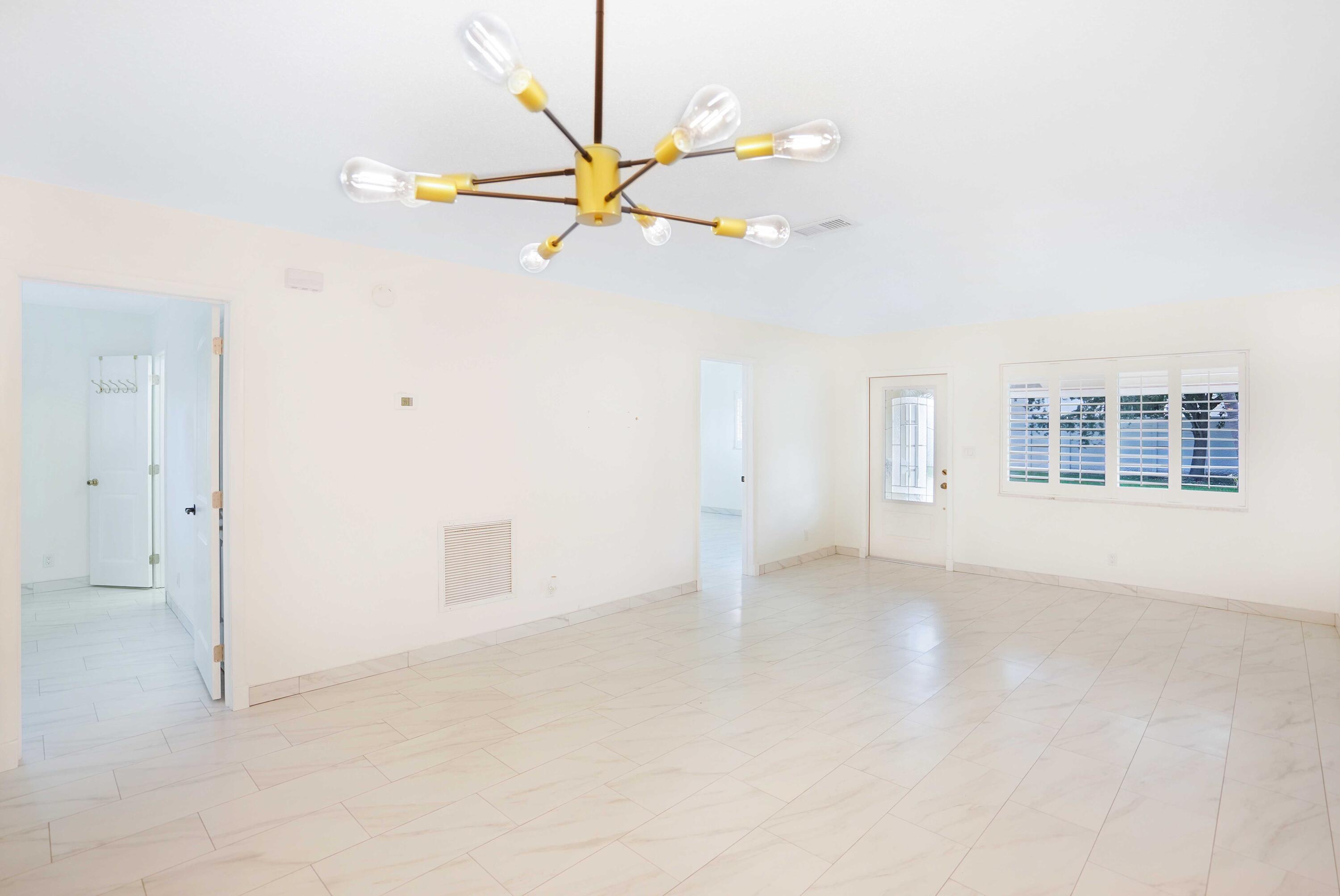 5100 Northeast 22nd Avenue Lighthouse Point, FL 33064 - Photo 28 of 31 wooden floor in an empty room