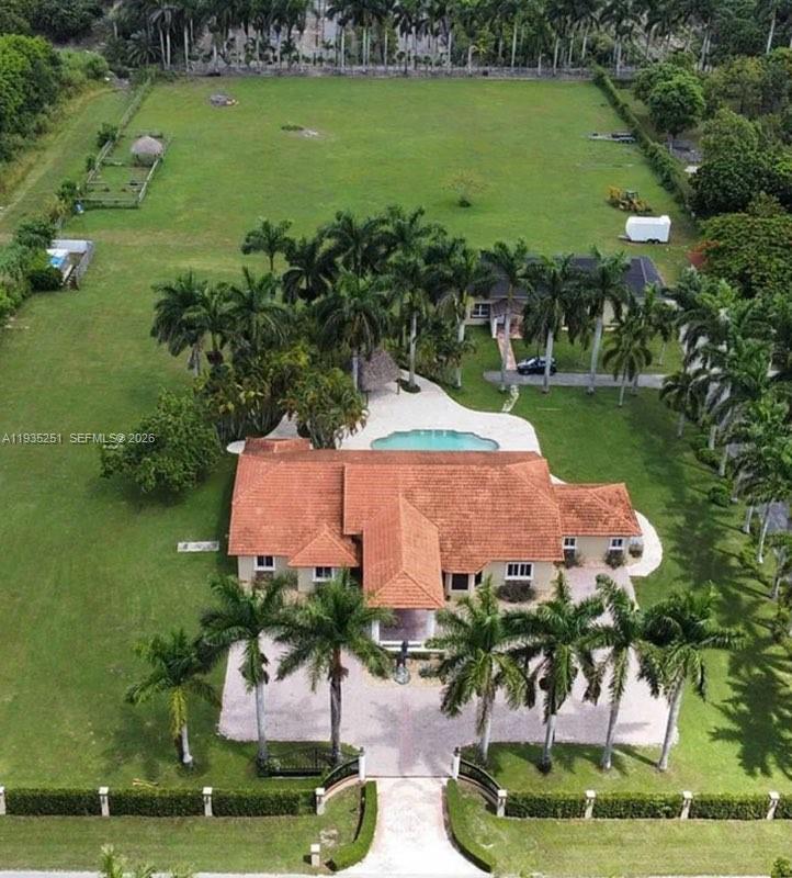 19701 Southwest 197th Avenue Miami, FL 33187 - Photo 18 of 19 an aerial view of a house with a yard