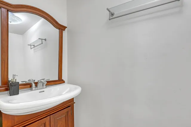 a view of a bathroom from a hallway