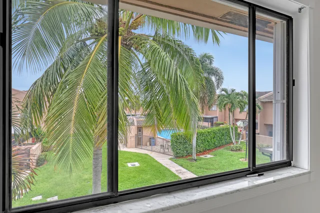 a bathroom with a granite countertop sink a toilet and bathtub