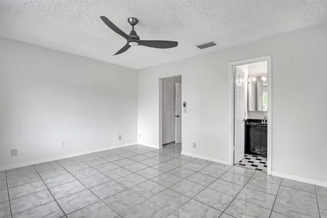 a utility room with a sink dryer and washer