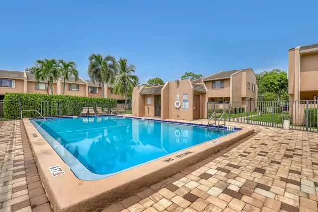 a swimming pool view with a outdoor space